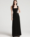 Long and lean, this graceful BCBGMAXAZRIA dress is timeless in black, finished with a cutout V back for a sophisticated finish.