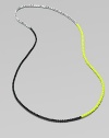 A trio of contrasting colors make this a stand-out piece. Glass and acrylic beadsLength, about 43Slip-on styleImported 