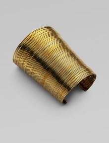 Totally simple and totally fabulous, this stunning open cuff, worthy of an ancient Egyptian princess, is gracefully formed of delicate brass wires with a polished finish.BrassDiameter, about 2½Length, about 4¼Imported Totally simple and totally fabulous, this stunning open cuff, worthy of an ancient Egyptian princess, is gracefully formed of delicate brass wires with a polished finish.BrassDiameter, about 2½Length, about 4¼Imported
