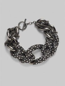 Multiple links with pavé detailing and delicate woven chain.Glass Metal Length, about 7½ Toggle closure Imported Multiple links with pavé detailing and delicate woven chain.Glass Metal Length, about 7½ Toggle closure Imported