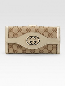 Metallic leather and canvas with GG logo detail in a continental silhouette.Flap and snap closureOne outside snap pocketOne inside zip coin pocketTwo inner bill compartmentsSeven credit card slotsLeather lining7½W X 3½H X 1DMade in Italy