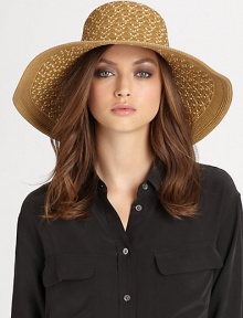 This dramatic, packable straw topper features signature logo rivets, elasticized inner band and an oversized, sloped brim for maximum sun protection and style.Brim, about 4.75Elasticized inner band fits most95% UVA/UVB protectionPolypropylene/polyesterSpot cleanImported and hand-finished in the USA This dramatic, packable straw topper features signature logo rivets, elasticized inner band and an oversized, sloped brim for maximum sun protection and style.Brim, about 4.75Elasticized inner band fits most95% UVA/UVB protectionPolypropylene/polyesterSpot cleanImported and hand-finished in the USA