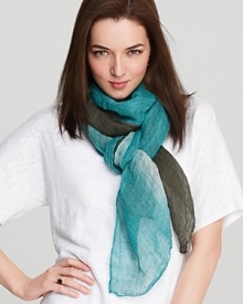 Add a flourish of femininity to everyday staples with this Eileen Fisher scarf that taps into the color blocking trend. Offset the statement piece against sleek white separates.