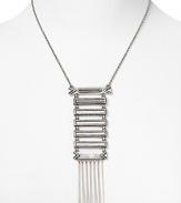 Tap this season's tribal-inspired trend with House of Harlow 1960's totem pole pendant. This linear pendant makes a cool statement with a bold lip and messy top knot.