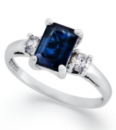 A subtle touch of blue. This vibrant 14k white gold ring features an emerald-cut sapphire (1-1/10 ct. t.w.) and round-cut diamond side stones (1/5 ct. t.w.).