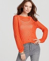 Sheer and flaunting an exposed back, this citrus-hued Rebecca Taylor sweater is the one to own. Flaunting the perfect touch of attitude to exude downtown cool with your favorite skinnies, it masters practicality, designed in a lightweight cotton for the perfect spring layer.