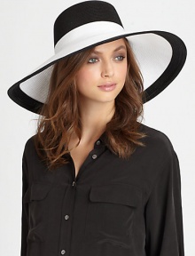 A colorblocked design adds a stylish touch to this dramatic, lightweight topper with elasticized inner band and an oversized brim for maximum sun protection.Brim, about 6.5Elasticized inner band fits most95% UVA/UVB protectionPolypropylene/rayon/polyesterSpot cleanImported and hand-finished in the USA A colorblocked design adds a stylish touch to this dramatic, lightweight topper with elasticized inner band and an oversized brim for maximum sun protection.Brim, about 6.5Elasticized inner band fits most95% UVA/UVB protectionPolypropylene/rayon/polyesterSpot cleanImported and hand-finished in the USA