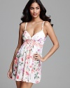 A floral print chemise with a contrast lace empire waist for a pretty bedtime look.