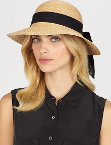 Fine braided raffia accented with polka dot ribbon trim can be worn with brim turned up or rolled down. Bow at back Adjustable sizing cord Brim, about 3½ Imported Fine braided raffia accented with polka dot ribbon trim can be worn with brim turned up or rolled down. Bow at back Adjustable sizing cord Brim, about 3½ Imported