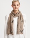 EXCLUSIVELY AT SAKS.COM. An ultra-soft, ultra-plush wool blend knit wrap is given a feminine update with crystal embellishment.40% polyester/28% nylon/17% wool/10% angora/5% cashmereAbout 10 X 64Dry cleanImported