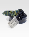 Sleek, full-grained leather finished with printed interior and contrast stitching for an unexpected pop of color.Metal buckleAbout 1½ wideImported