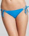 Full swim briefs with adjustable side tie details. From Robin Piccone.