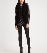 Work the trend in this luscious faux fur vest with a shawl collar and convenient hook-and-eye closure. Shawl collarFront hook-and-eye closureFully linedAbout 25 from shoulder to hemPolyester faux furDry cleanMade in USA of Italian fabricModel shown is 5'10 (177cm) wearing US size Small.