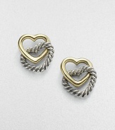 From the Cable Heart Collection. A polished open heart of 14k yellow gold is linked forever to a cabled heart of sterling silver. Sterling silver and 14k yellow gold Width, about ¾ Post back Made in USA