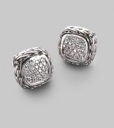 A striking square of textured sterling silver, richly set with a center of pavé diamonds with accents of 18k white gold. Diamonds 0.34 tcw Sterling silver and 18k white gold About ½ square Post back Imported