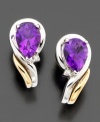 Pleasant purple delights. These beautiful earrings feature pear-shaped amethyst (1-1/3 ct. t.w.) and round-cut diamond accents set in 14k gold & sterling silver. Approximate length: 1/2 inches.