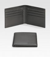 A classic leather bi-fold wallet with cut-out logo detail. Two bill compartments Six card slots 4.3W X 3.5H Made in Italy 