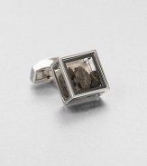 Inspired by the tale of Pandora's box in Greek mythology and featuring the Tateossian signature element of surprise, this glass-box cuff link holds iron meteorites. The Campo del Cielo meteorites originate from the 5000 year old crater found in Argentina, in 1576, each iron meteorite has a rough and natural shape.Sold separatelyBrass and glassEnamel trimMade in United Kingdom