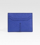 A sleek, slim-line credit card case designed in textured leather. Top-loading currency pocket Two card slots 4 X 3 Made in Italy 