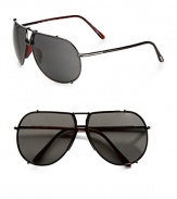 An incredibly modern design in lightweight metal complements a classic aviator frame. Available in shiny dark gunmetal frames with grey lenses.Metal100% UV ProtectionMade in Italy