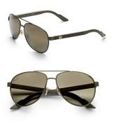 Lightweight metal frames with web stripe logo detail at temple. Available in palm green with grey gradient lens, blue white with smoke mirror gradient lens and shiny black/brown tortoise with grey gradient lens.100% UV protectionMade in Italy