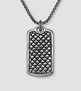 A woven texture in fine sterling silver. Includes 26 silver chain 1W X 1½H Made in USA