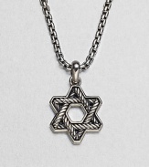 The familiar angles of the Star of David are intricately carved, set in polished sterling silver on a box-chain necklace.Sterling silverbulletNecklace, about 20 longPendant, about 1 wideLobster claspImported