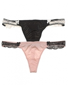 A silky soft thong with delicate lace detail at hips and back for a girlish touch. A silky soft thong with delicate lace detail at hips and back for a girlish touch.
