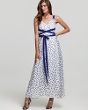 A crisscrossing ribbon belt flatters the waist on this Jill Stuart Dress maxi dress, emboldened by the season's favorite print: polka dots.