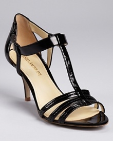 A staple sandal from Enzio Angiolini--featuring a 3 heel that's perfect for all-day wear, these lustrous patent pretties boast all the makings of a must-have shoe. A staple sandal from Enzio Angiolini--featuring a 3 heel that's perfect for all-day wear, these lustrous patent pretties boast all the makings of a must-have shoe.
