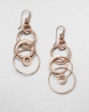 This organically designed style features multi-layered hoops in 18k gold and sterling silver with 18k rose goldplating. 18k gold and sterling silver with 18k rose goldplatingLength, about 2½Hook backImported 