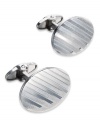 The perfect accent for the modern-day business man. These sleek oval-shaped cuff links feature a trendy striped design in sterling silver. Approximate length: 1-7/8 inches. Approximate width: 5/8 inch.