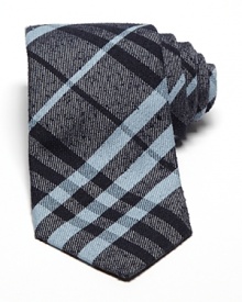 Burberry London preserves its heritage with a sophisticated signature check tie, crafted for a classic look that pairs well dressed up or down. Burberry London preserves its heritage with a sophisticated signature check tie, crafted for a classic look that pairs well dressed up or down.