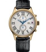 For the dashing gentleman. Handsome watch by Tommy Hilfiger crafted of black croc-embossed leather strap and round gold ion-plated stainless steel case. Textured silver tone dial features applied black Roman numerals, date window and logo at three o'clock, two multifunctional subdials and three blue hands. Quartz movement. Water resistant to 30 meters. Ten-year limited warranty.