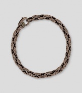 A unique, engraved mix of cocoa bronze and polished, 18K gold in an anchor link design. Bracelet, about 8½ long Lobster clasp closure Made in USA