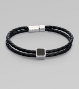 A double strand of braided Italian leather is offset by a sterling silver cube on one side and clasp on the other. Black leather bracelet features agate and sodalite inlay Brown leather bracelet features tiger's eye and ebony inlay Leather Sterling silver About 8¼ long Pop clasp Made in the United Kingdom 