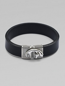 Simply elegant bracelet of smooth leather joined together by a detailed silver clasp.LeatherSilverAbout 3 diam.Lobster claw claspImported Simply elegant bracelet of smooth leather joined together by a detailed silver clasp.LeatherSilverAbout 3 diam.Lobster claw claspImported