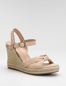 A country-inspired sandal is rendered in the softest leather.Rope-trim wedge heel, 4 (100mm) Rope-trim platform, 1 (25mm) Compares to a 3 heel (75mm) Concealed Nike Air technology Open toe Adjustable ankle strap Leather lining and sole Padded insole ImportedOUR FIT MODEL RECOMMENDS ordering one half size up as this style runs small. 