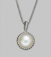 A traditional pearl goes modern with this sterling silver, cable-wrapped pendant on a silver chain. White freshwater pearl Sterling silver Chain length, about 18 Pendant diameter, about ½ Lobster clasp Imported
