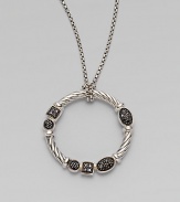 From the Confetti Collection. A sterling silver cabled wreath, hanging from a pretty box chain, is dotted with black pavé diamonds in sparkling geometric shapes. Diamonds, 0.14 tcw Sterling silver and rhodium plating Chain length, about 16 Pendant diameter, about 1 Lobster clasp Imported