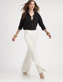 EXCLUSIVELY AT SAKS. An easy wide-leg silhouette tailored with crisp front pleats and a cuffed bottom, all in lightweight twill.Wide button-front waistbandPleated frontCuffed bottomBack welt pocketsConcealed side zipperInseam, about 3370% polyester/30% rayonDry cleanImportedModel shown is 5'10 (177cm) wearing US size 4.ABOUT THE DESIGNER Former fourth-grade schoolteacher Kara Laricks always told her students to be true to themselves. EXCLUSIVELY AT SAKS. An easy wide-leg silhouette tailored with crisp front pleats and a cuffed bottom, all in lightweight twill.Wide button-front waistbandPleated frontCuffed bottomBack welt pocketsConcealed side zipperInseam, about 3370% polyester/30% rayonDry cleanImportedModel shown is 5'10 (177cm) wearing US size 4.ABOUT THE DESIGNER Former fourth-grade schoolteacher Kara Laricks always told her students to be true to themselves.