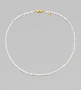 A single strand of luminous pearls with signature clasp closure.4mm white cultured pearls 18K yellow gold Length, about 16 Minuette clasp closure Imported 