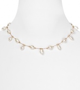 Margo Morrison's freshwater pearl necklace is a delicate detail. Designed to melt into the skin, this feminine piece will work just as well during the day as at night.