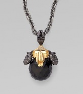 A goldplated and black rhodium plated sterling silver ram head, complete with pavé cubic zirconia, looms over a jet crystal, strung on a long elegant chain.Jet crystal Cubic zirconia Goldplated sterling silver Black rhodium plated sterling silver Chain length, about 30 Pendant width, about 1½ Lobster clasp Imported