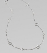 A long design punctuated with multiple sized circle links. Sterling silver Length, about 36 Lobster clasp closure Imported 