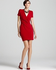 Chic details lend this stretch French Connection dress the perfect hint of femininity for an alluring office look. Chic details lend this stretch French Connection dress the perfect hint of femininity for an alluring office look.