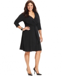 Dazzle from day to play with AGB's three-quarter sleeve plus size dress, outlined by a slimming faux wrap design.