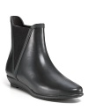 Make a chic splash in Loeffler Randall's rain booties, finished with elastic gores.