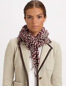 An ultra-warm, ultra-soft wool wrap with a bold zig-zag print and fringe trim.WoolAbout 45 X 45Dry cleanImported An ultra-warm, ultra-soft wool wrap with a bold zig-zag print and fringe trim.WoolAbout 45 X 45Dry cleanImported