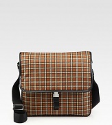 Plaid pattern shaped in a slim silhouette of tessuto nylon, for maximum comfort and wearability.Flap closureAdjustable shoulder strapInterior zip pocketsNylon11¾W x 10½H x 2½DMade in Italy